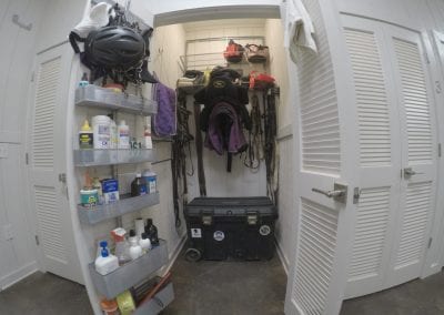 Storage closet with equestrian gear and supplies at Millstone Stables.